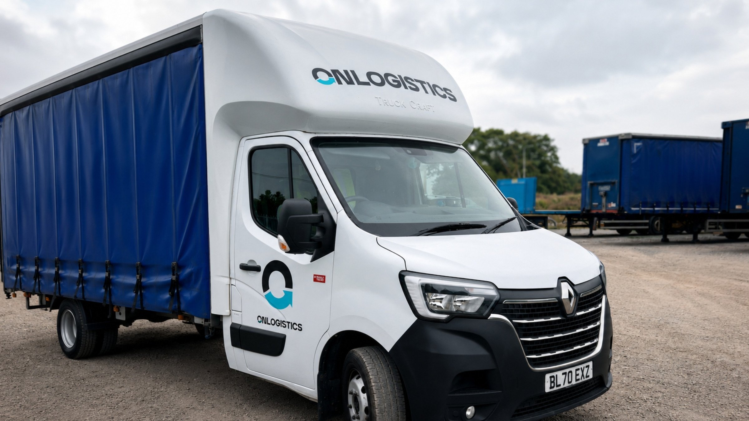 An OnLogistics van in a yard, with the wordmark on the body and the vertical lockup on the cab door