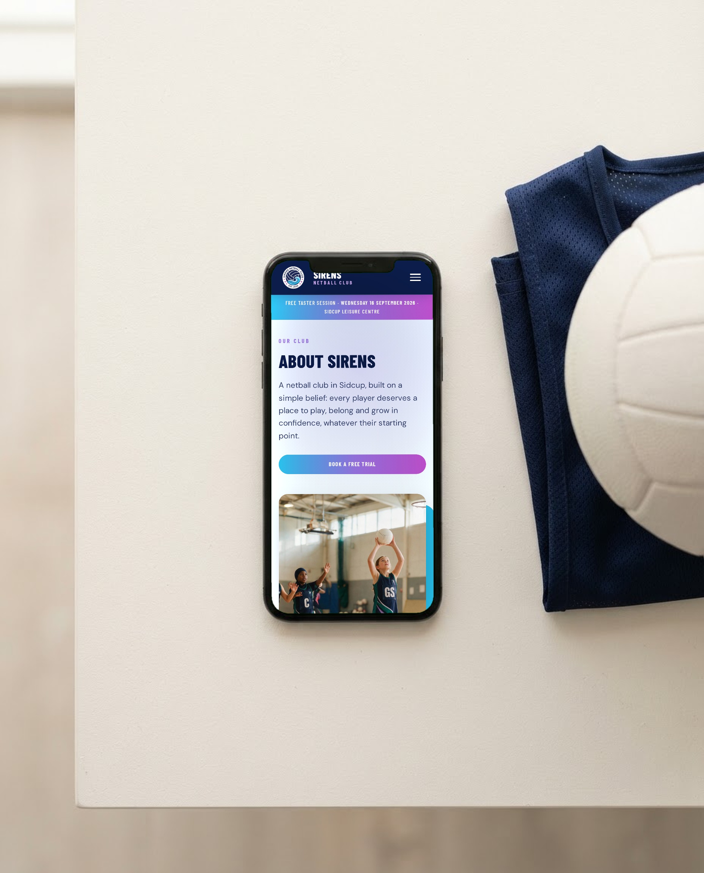 Mobile-first sports club website, the Sirens Netball Club about page on a phone