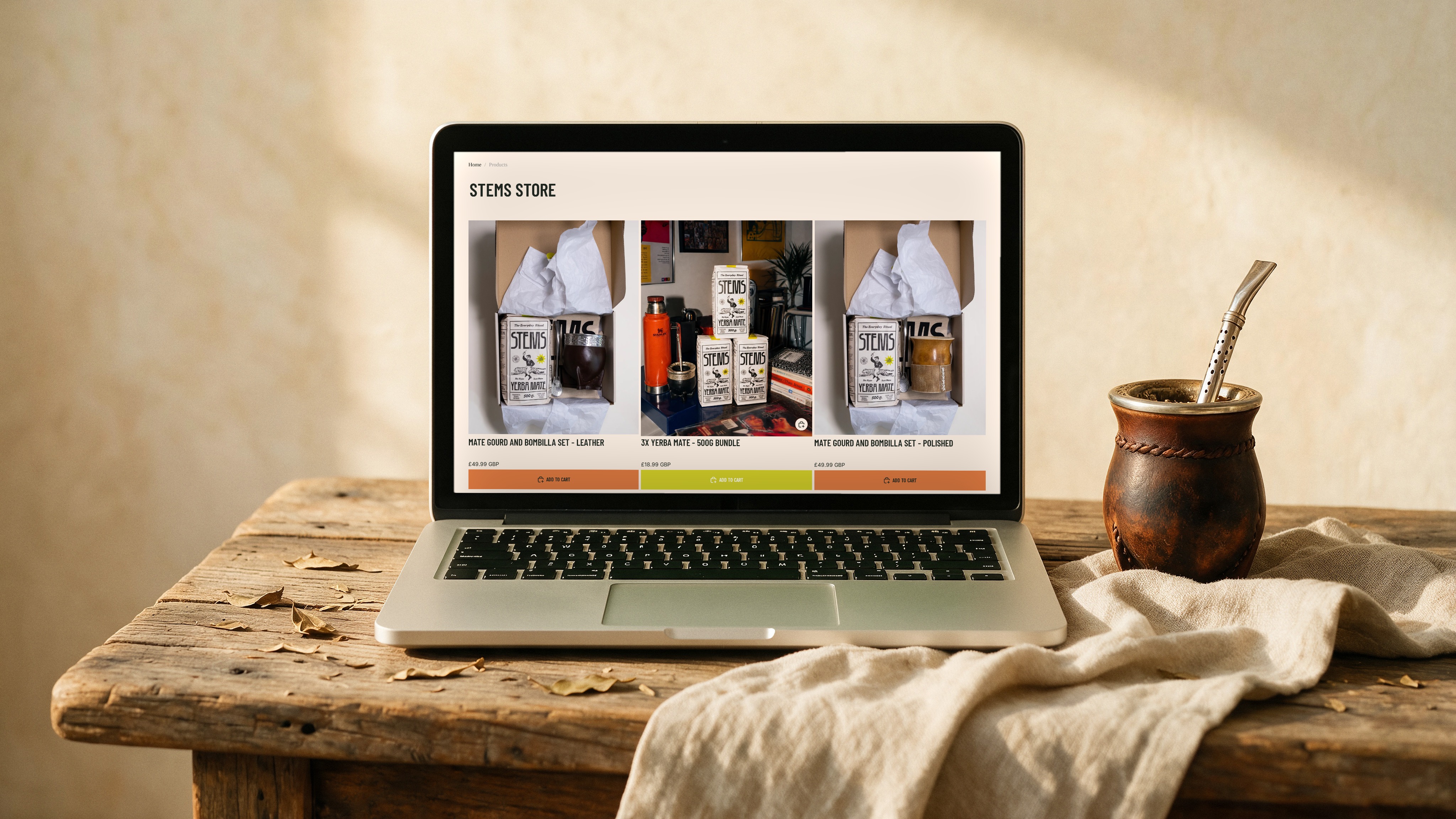 The Stems Shopify store page on a laptop, showing the product grid and pricing