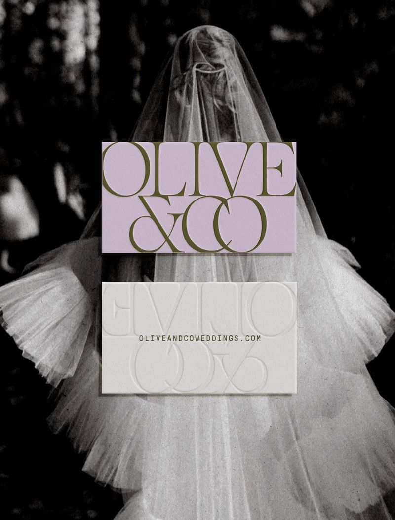 Olive & Co wedding planner identity by Kathlyn Jarvis Design: Tight, oversized, high-contrast serif caps with a nested ampersand on lilac cards, set against a black and white bridal photo